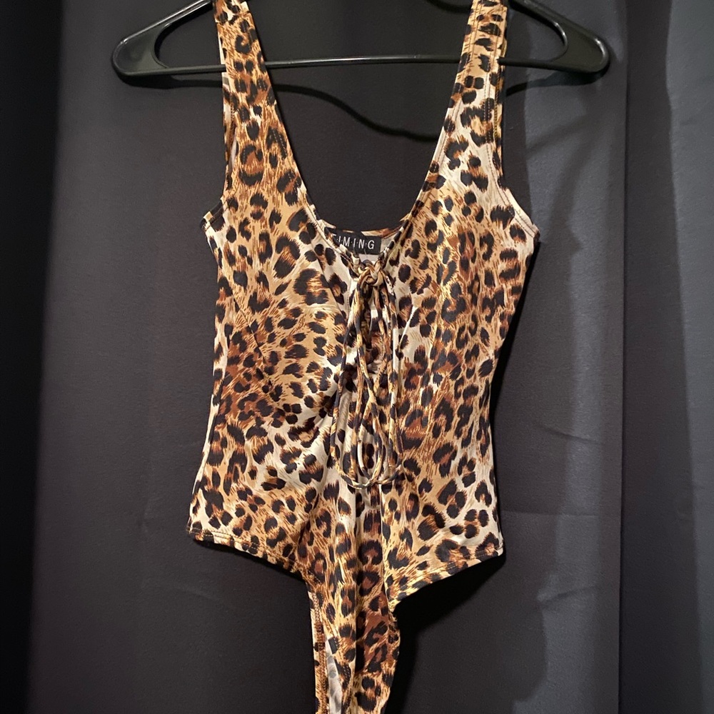 Leopard print body suit